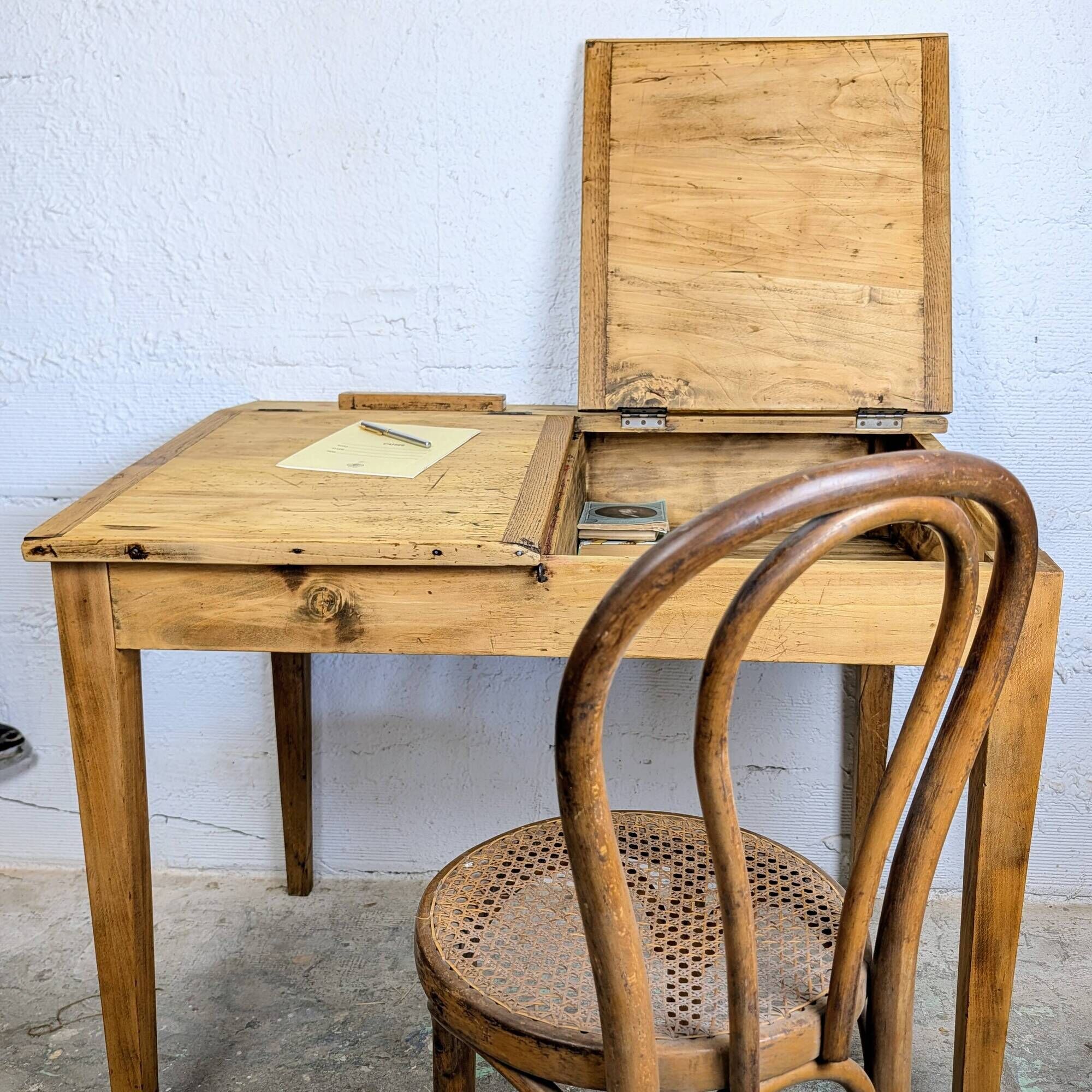 Antique wooden school desk with double lift-up tops.