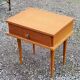 Vintage bedside table in golden blond oak conical feet from the 60s