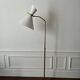 Adjustable Diabolo floor lamp in brass - 1950s