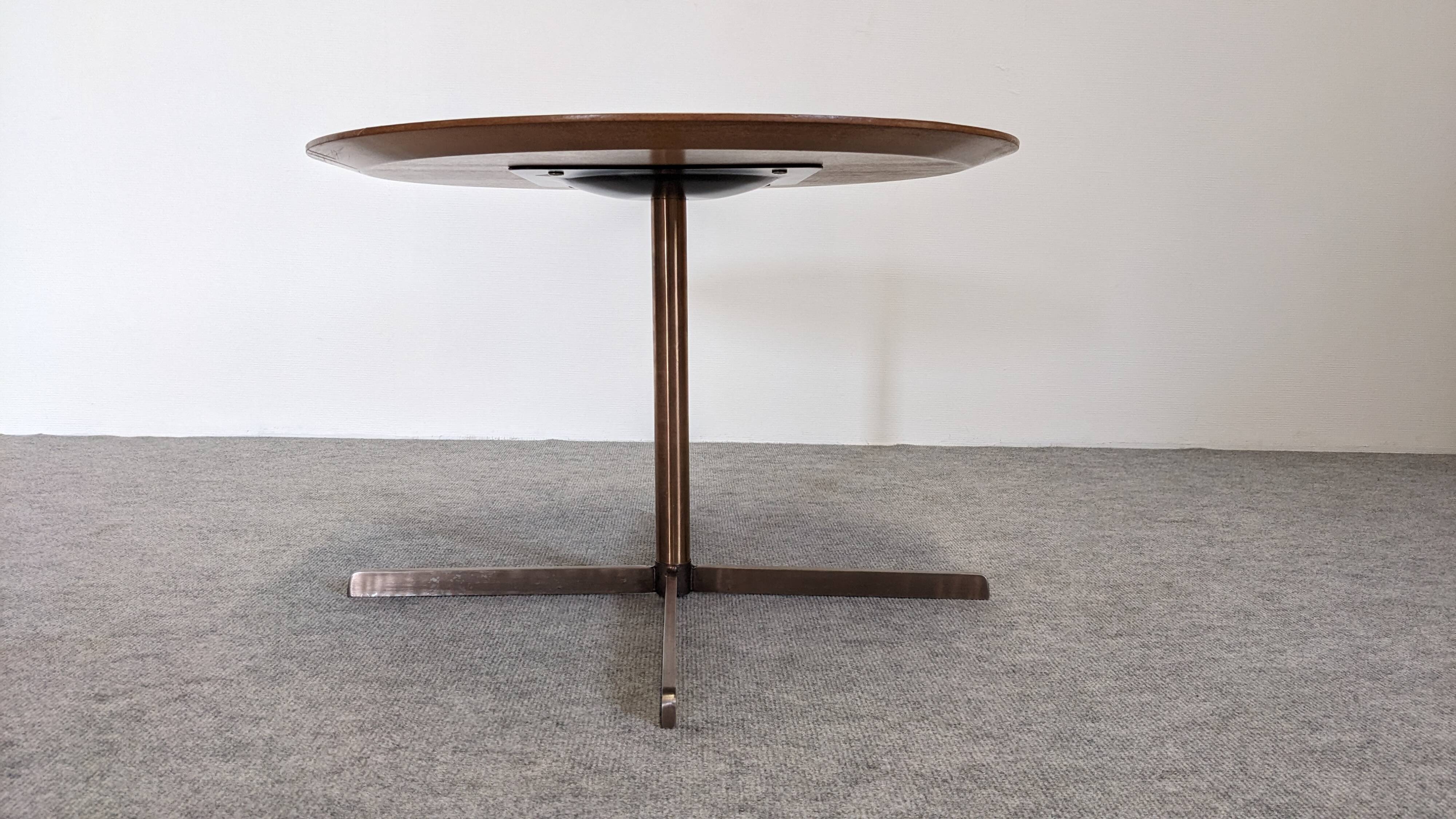 Contemporary round side table or end table.