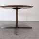Contemporary round side table or end table.