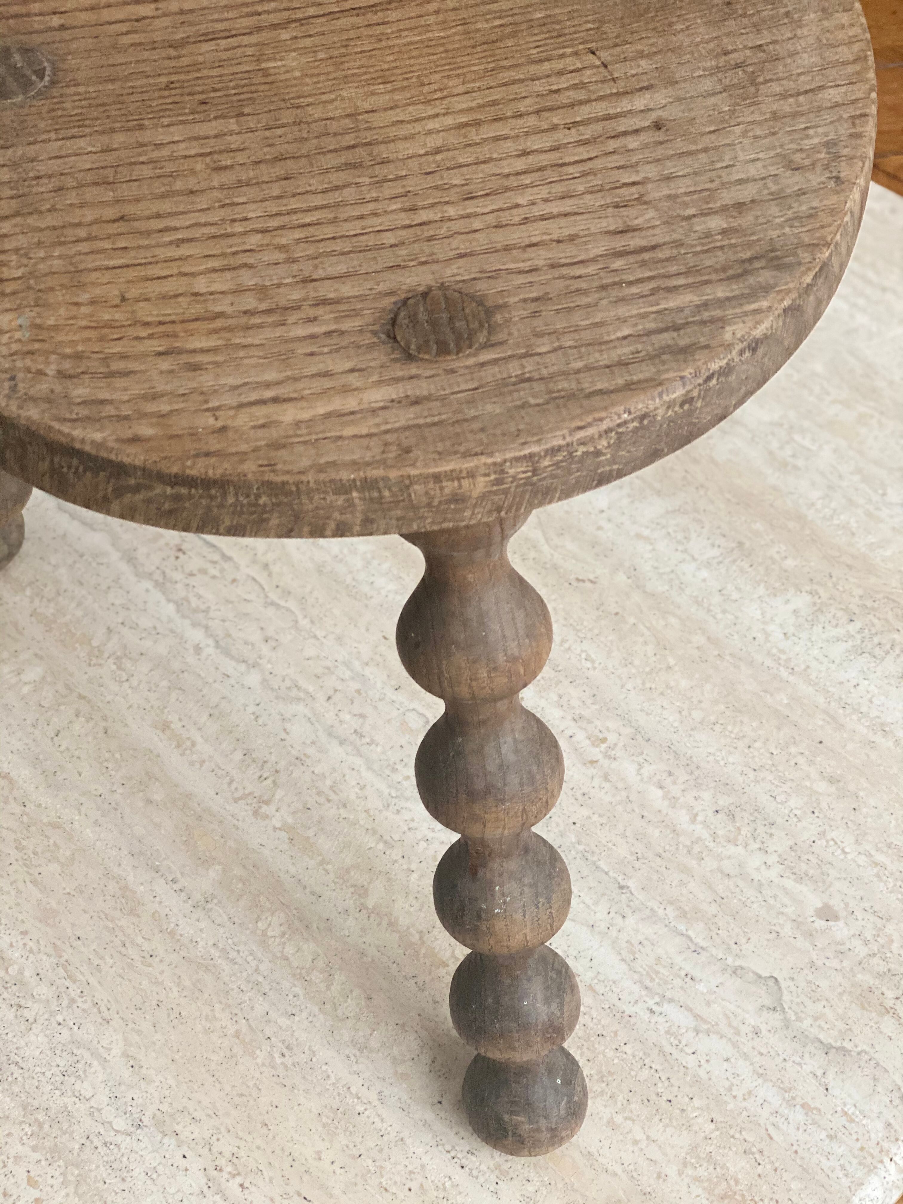 Small vintage wooden milking stool