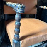 Armchair with lion head armrests