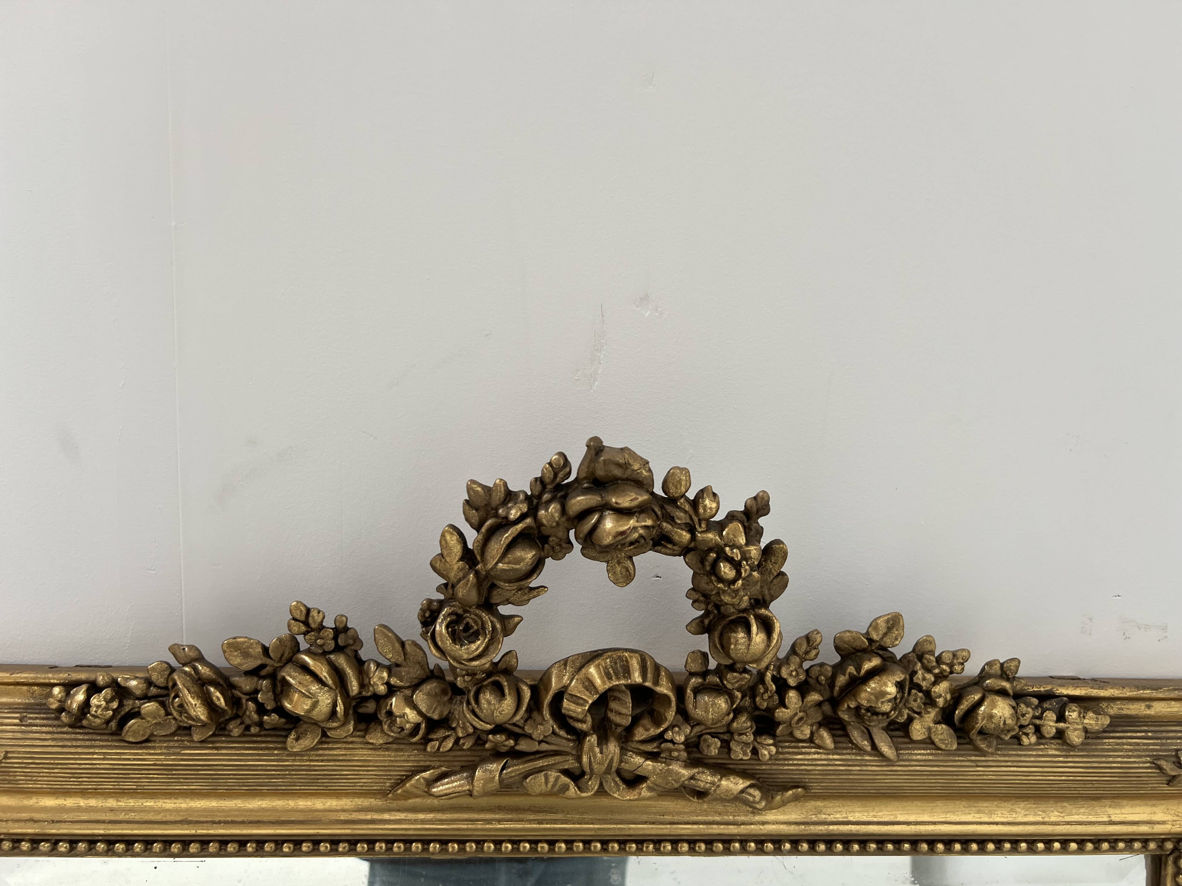 Louis XVI style mirror in wood and gilded stucco, 19th century