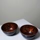 Pair of vintage hand-crafted blue and copper enamelled bowls.