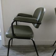 Pair of khaki green metal and skai armchairs from the 1960s