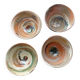 Fine earthenware bowls of mixed earth
