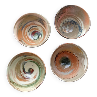 Fine earthenware bowls of mixed earth