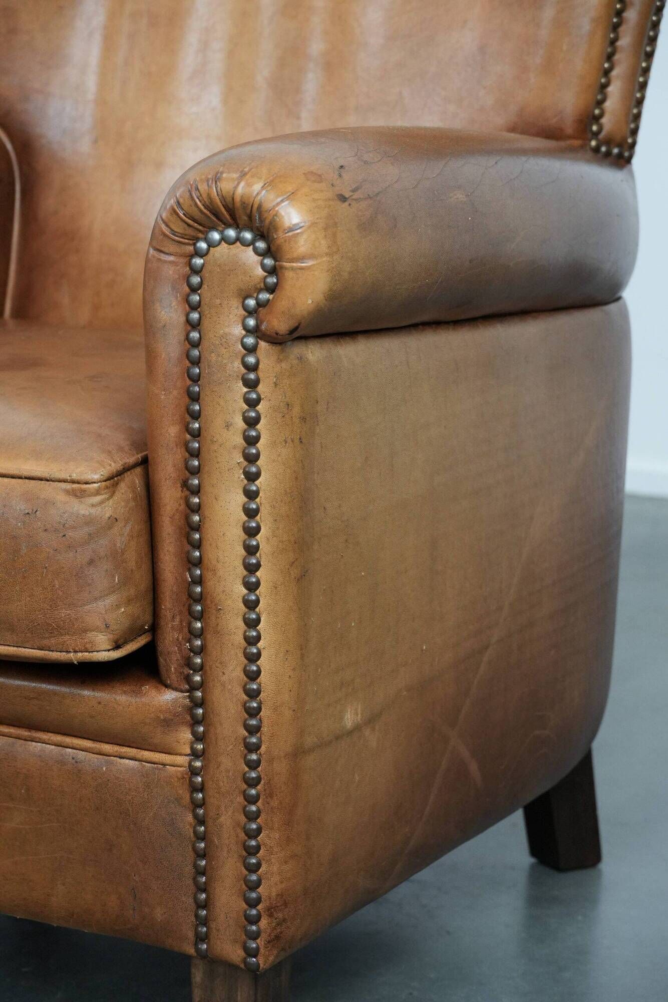 Set of two vintage sheepskin armchairs with beautiful and warm colours