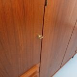 High Scandinavian modernist vintage sideboard in teak and black metal.