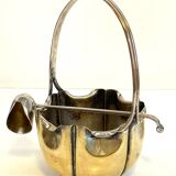 silver metal sugar bowl with gold patina