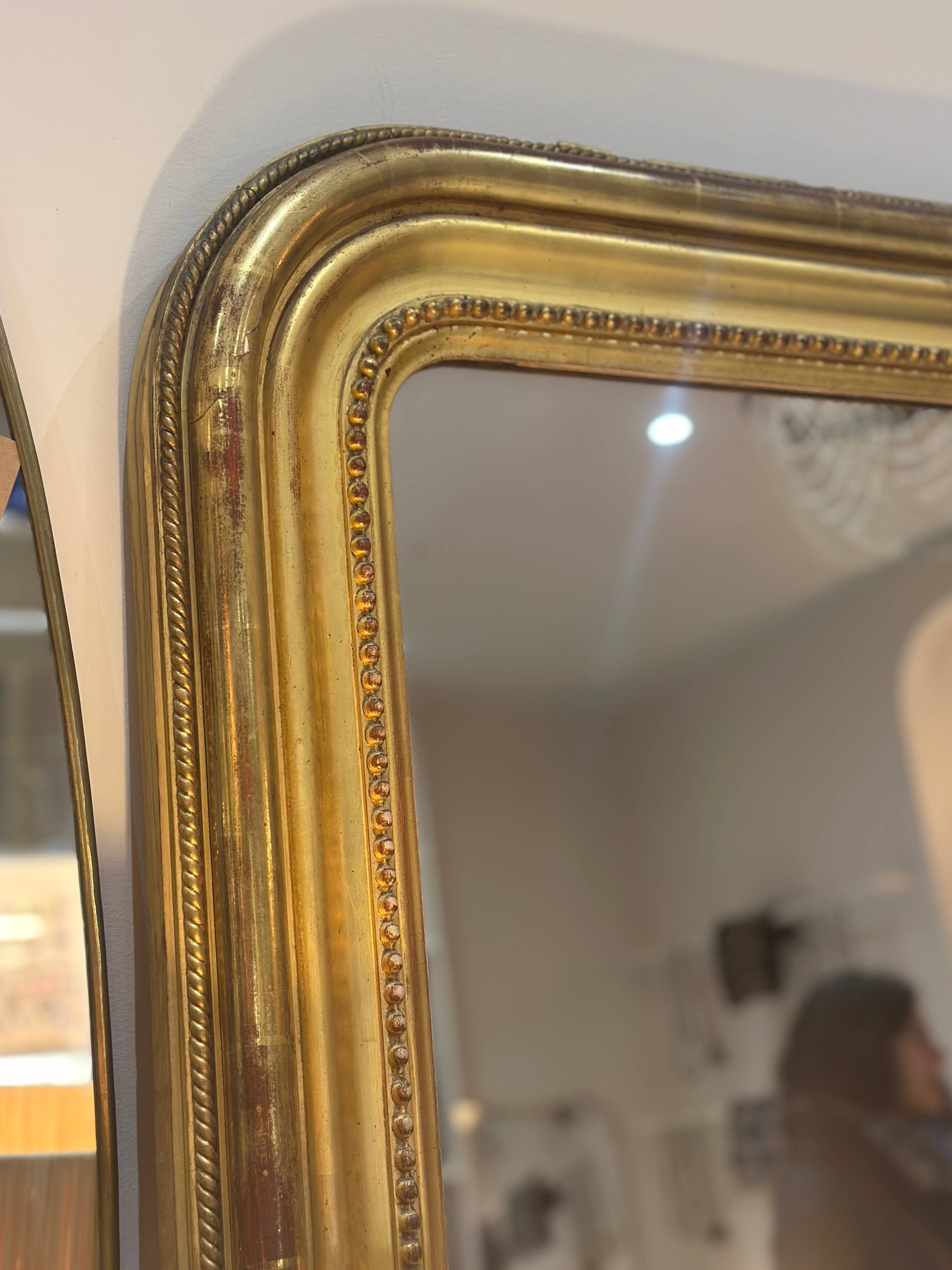 Miroir ancien Louis Philippe doré feuille d’or - 185 x 104 cm