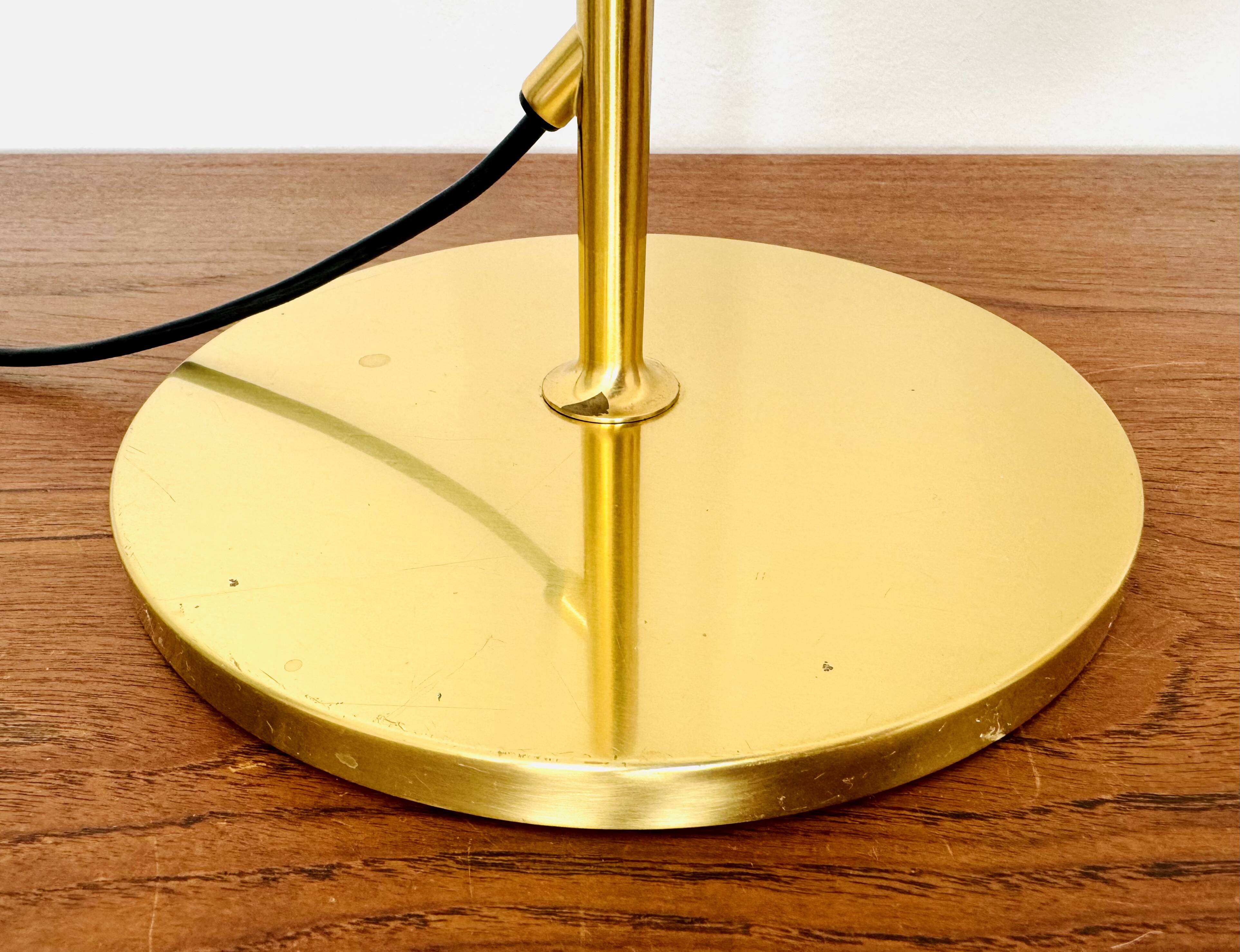 Adjustable Brass Floor Lamp by Florian Schulz