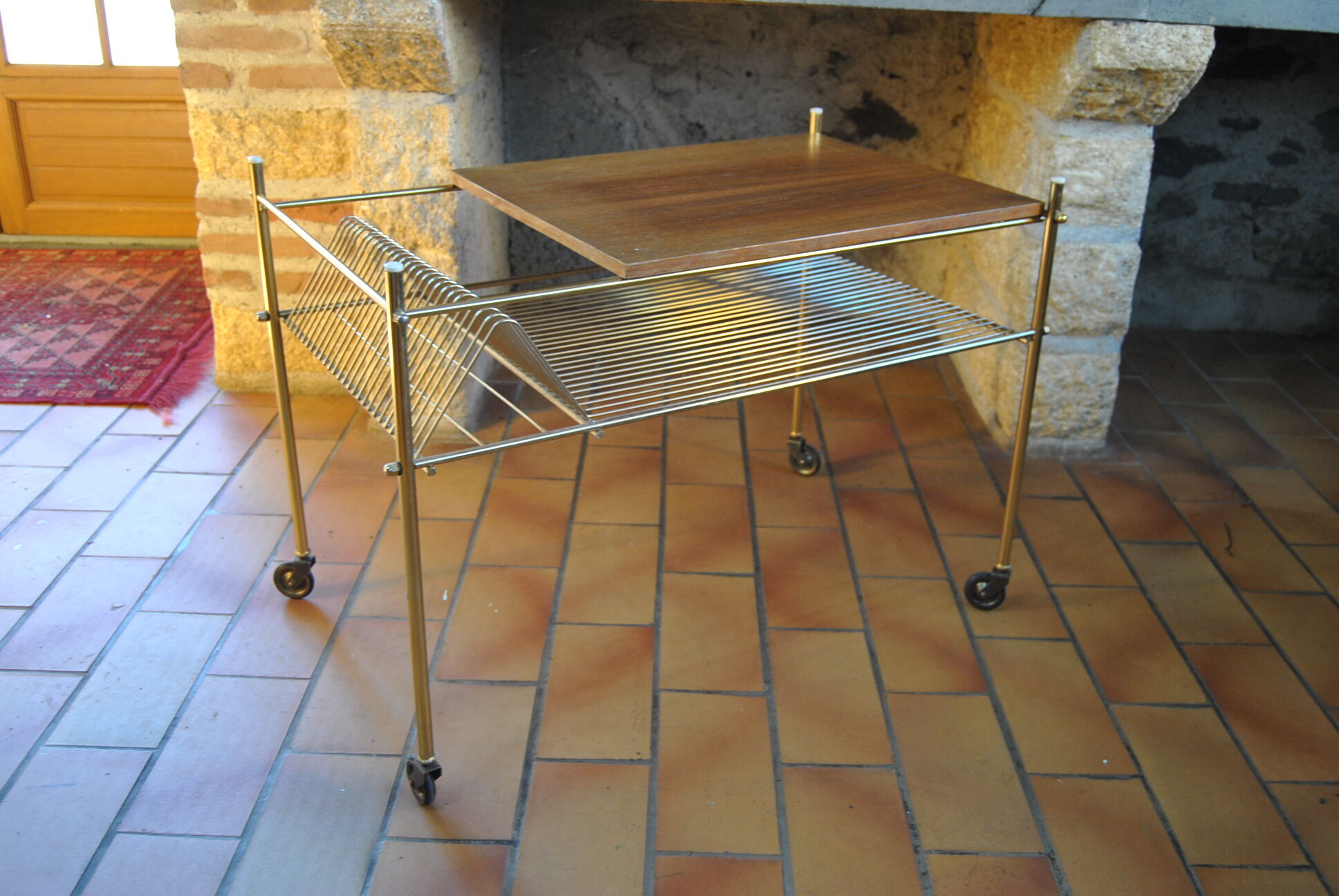 Vinyl storage cabinet with vintage wheels 70s