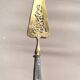 Silver cake server with gilded metal, pierced blade, 19th century.