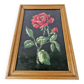 Canvas under vintage pink frame on black background