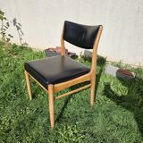 Scandinavian chair with faux leather seat and back