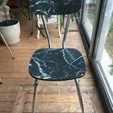 4 chairs in very dark green formica marble effect