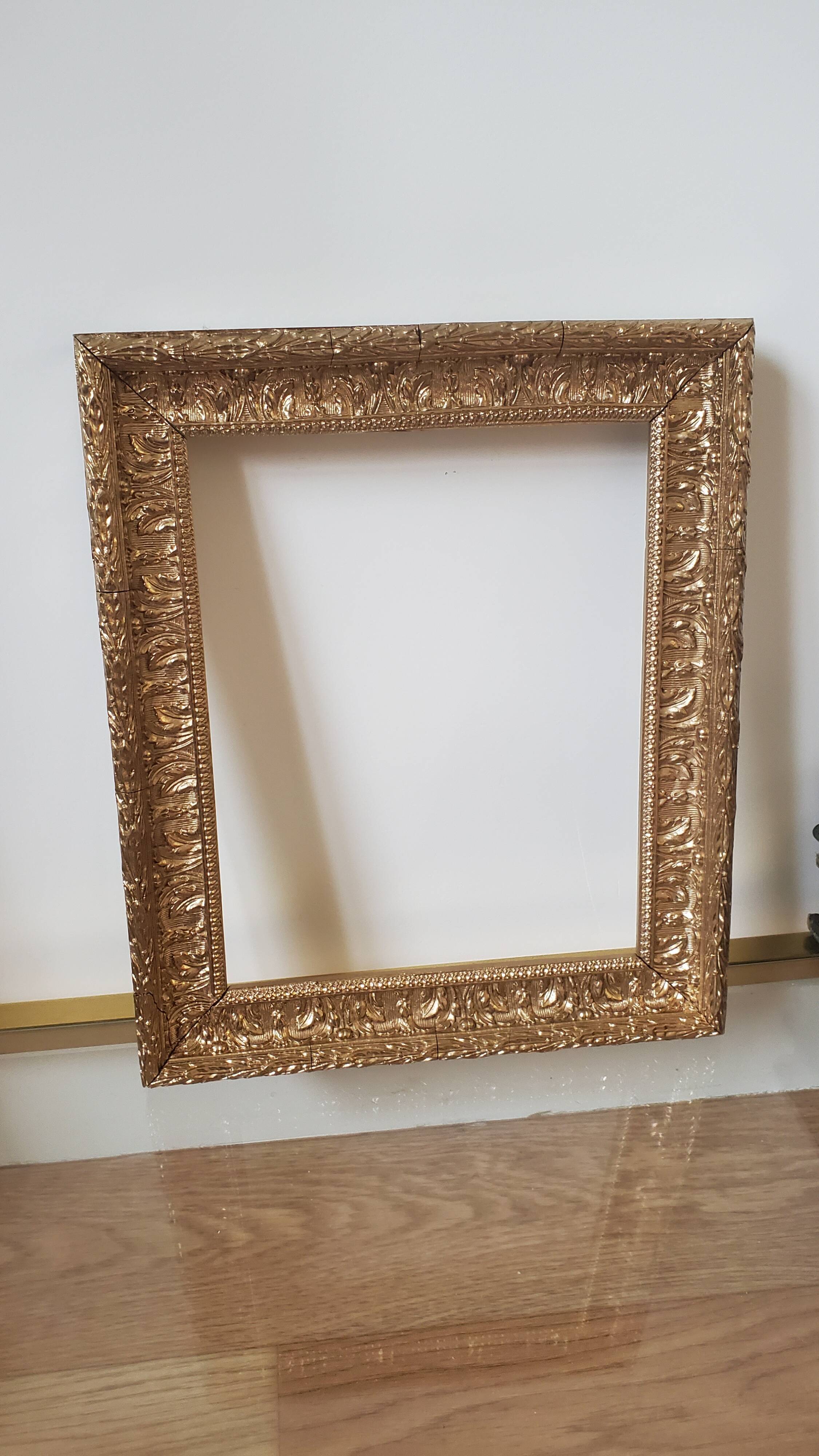 Old gilded carved wooden frame