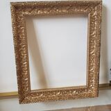 Cadre ancien en bois sculpté doré
