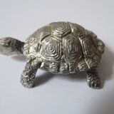 Small box in the shape of a silver metal turtle