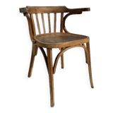 Curved wooden armchair