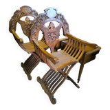 Pair of curule armchairs in solid teak circa 1980