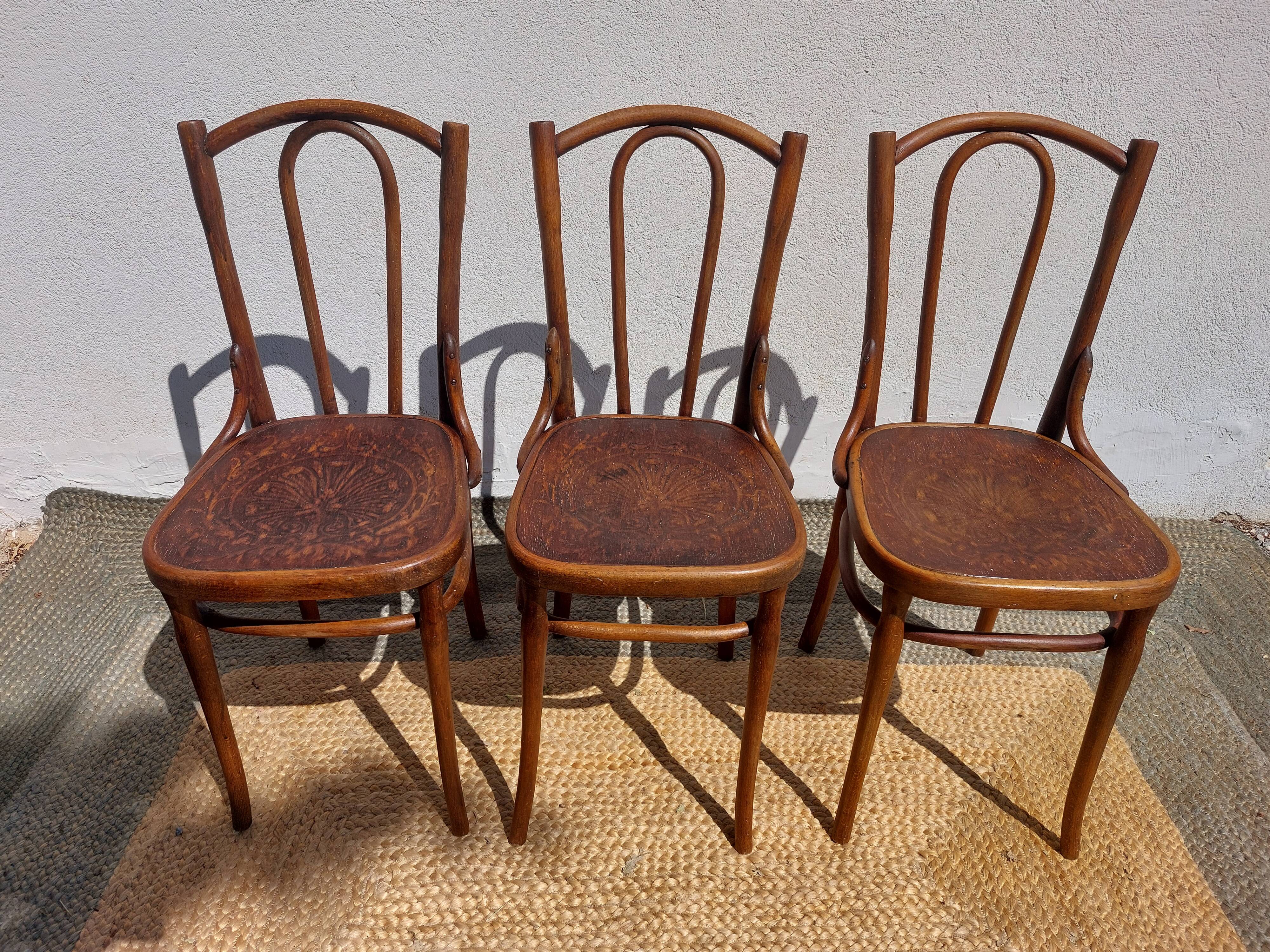 set of 3 curved wooden bistro chairs with patterns