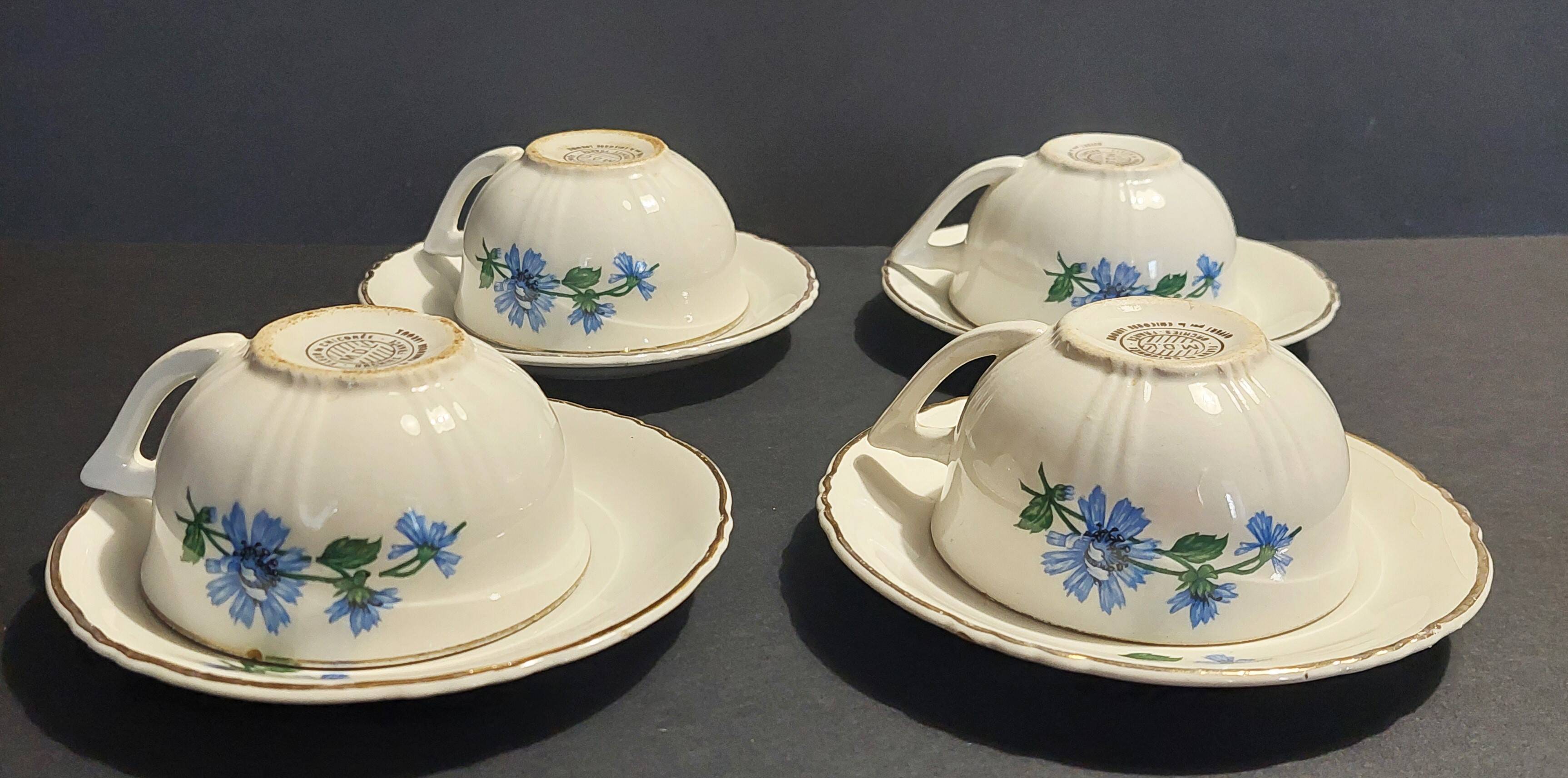 Series of four Orchies earthenware cups with chicory flower decoration