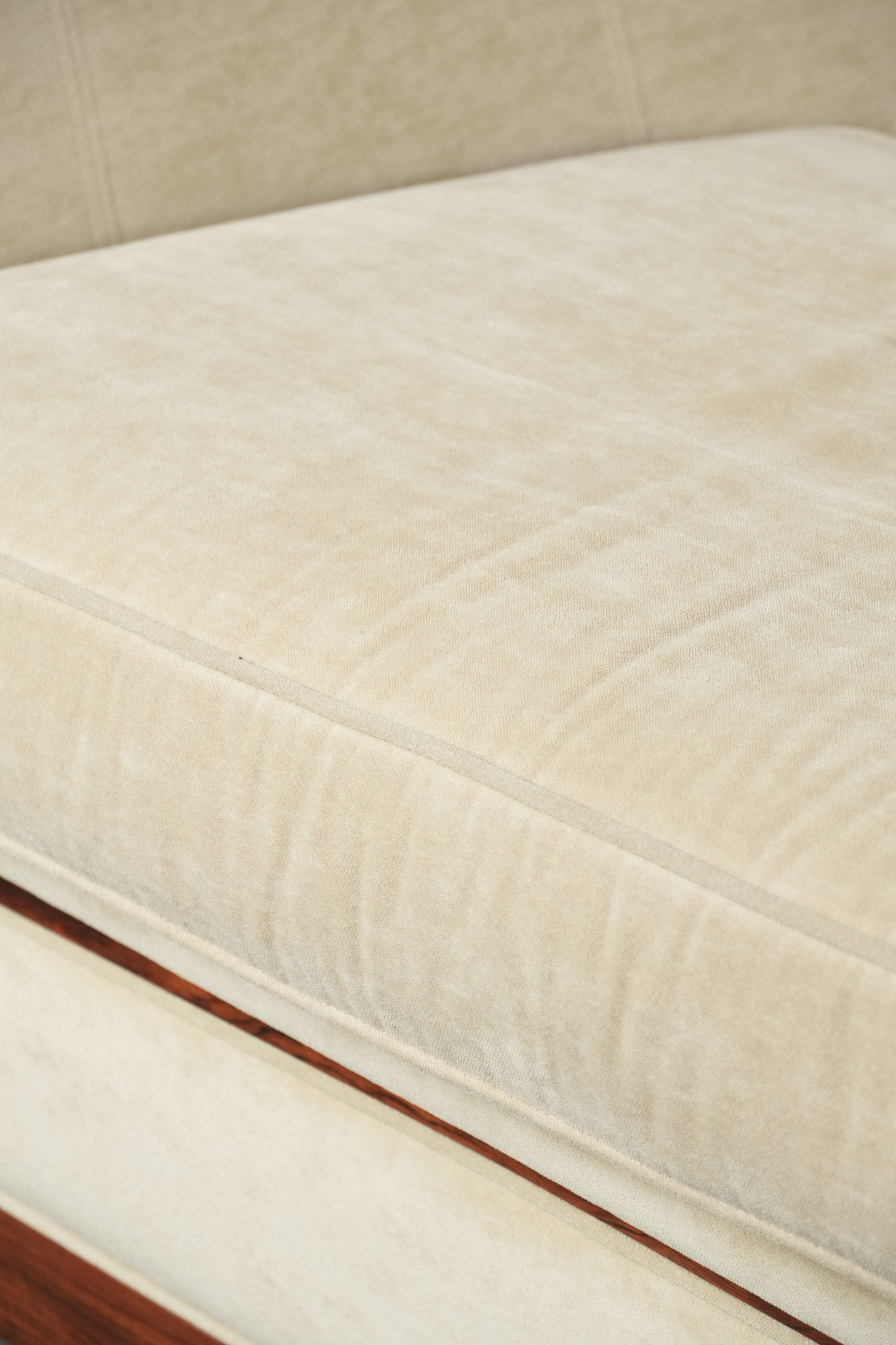 Art Deco design sofa with beautiful woodwork and cream fabric upholstery