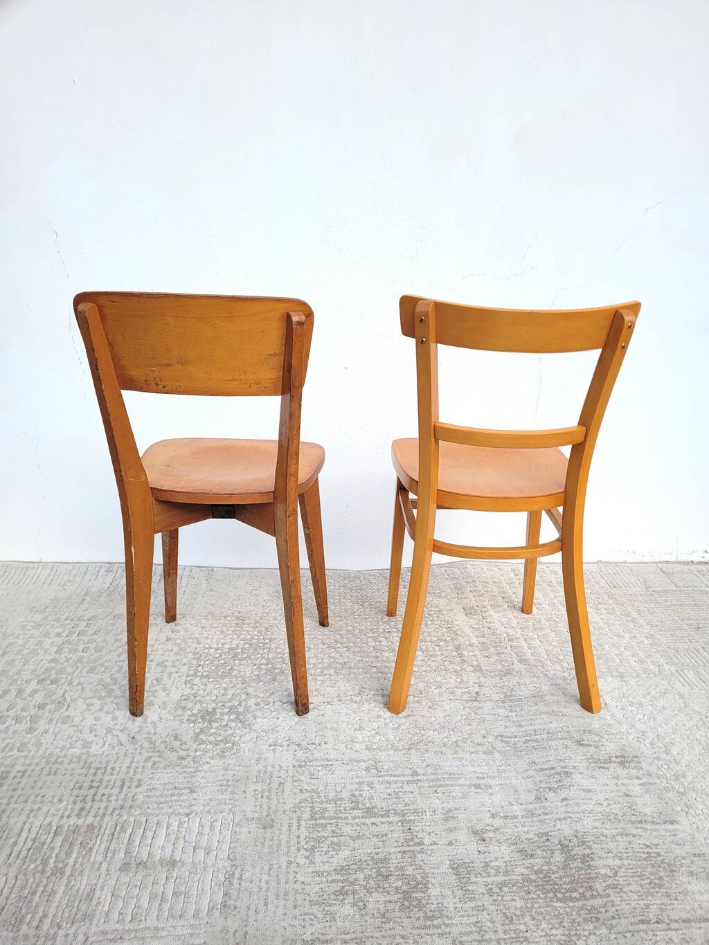 Pair of bistro chairs, one Thonet.