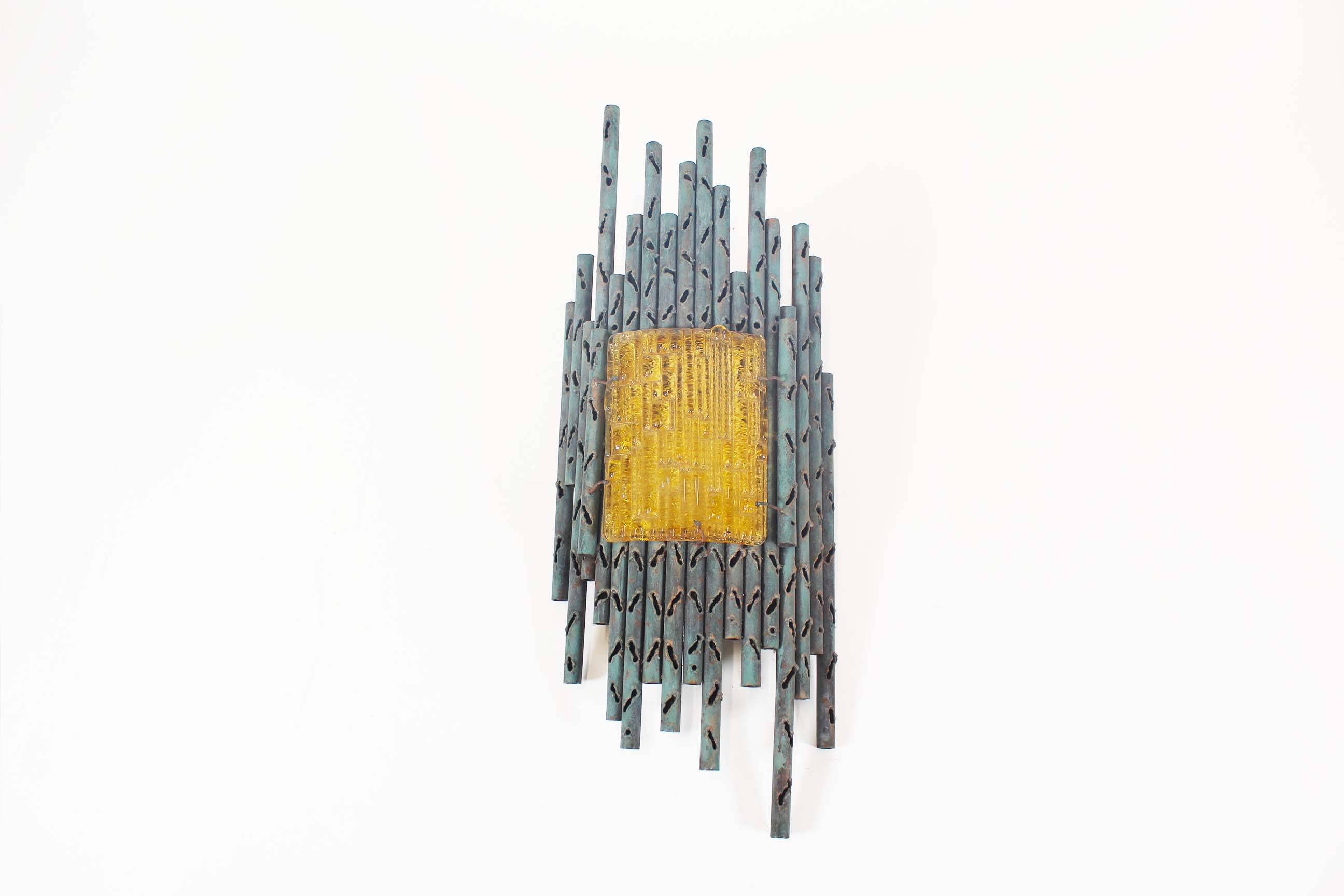 brutalist rough iron and glass wall sconce by Marcello Fantoni