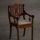 Danish popular art armchair in oak with a lambswool seat, early 20th century, 1930s.