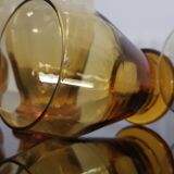 4 old amber colored glasses