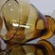 4 old amber colored glasses