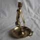 Anti-roll pendulum candlestick