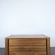 Commode trois tiroirs en bois massif dans le goût de Maison Regain