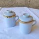 2 white and gold Limoges porcelain tea cups