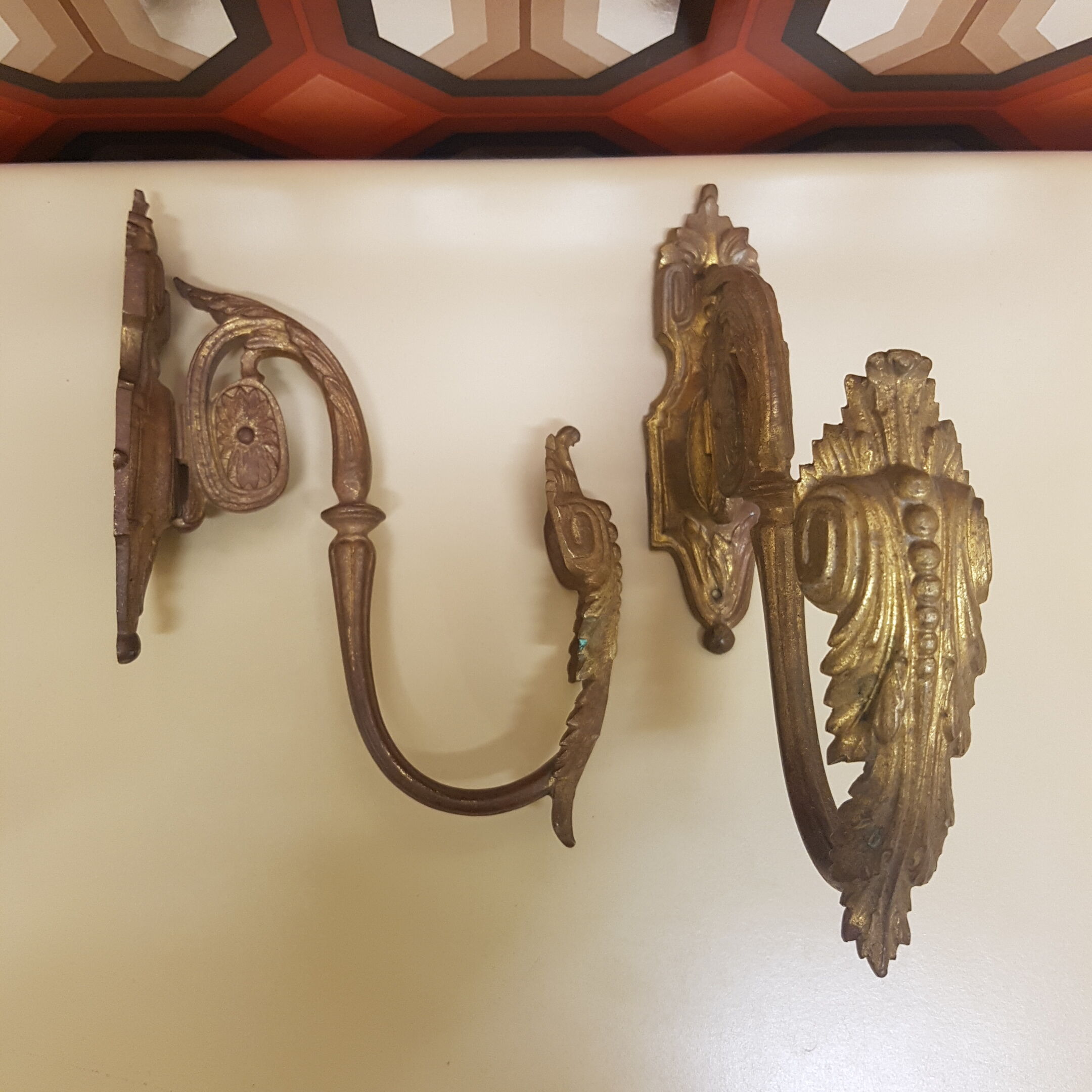 Pair of gilt bronze pegs