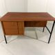 Independent teak and black steel desk by Günter Renkel, 1960s.