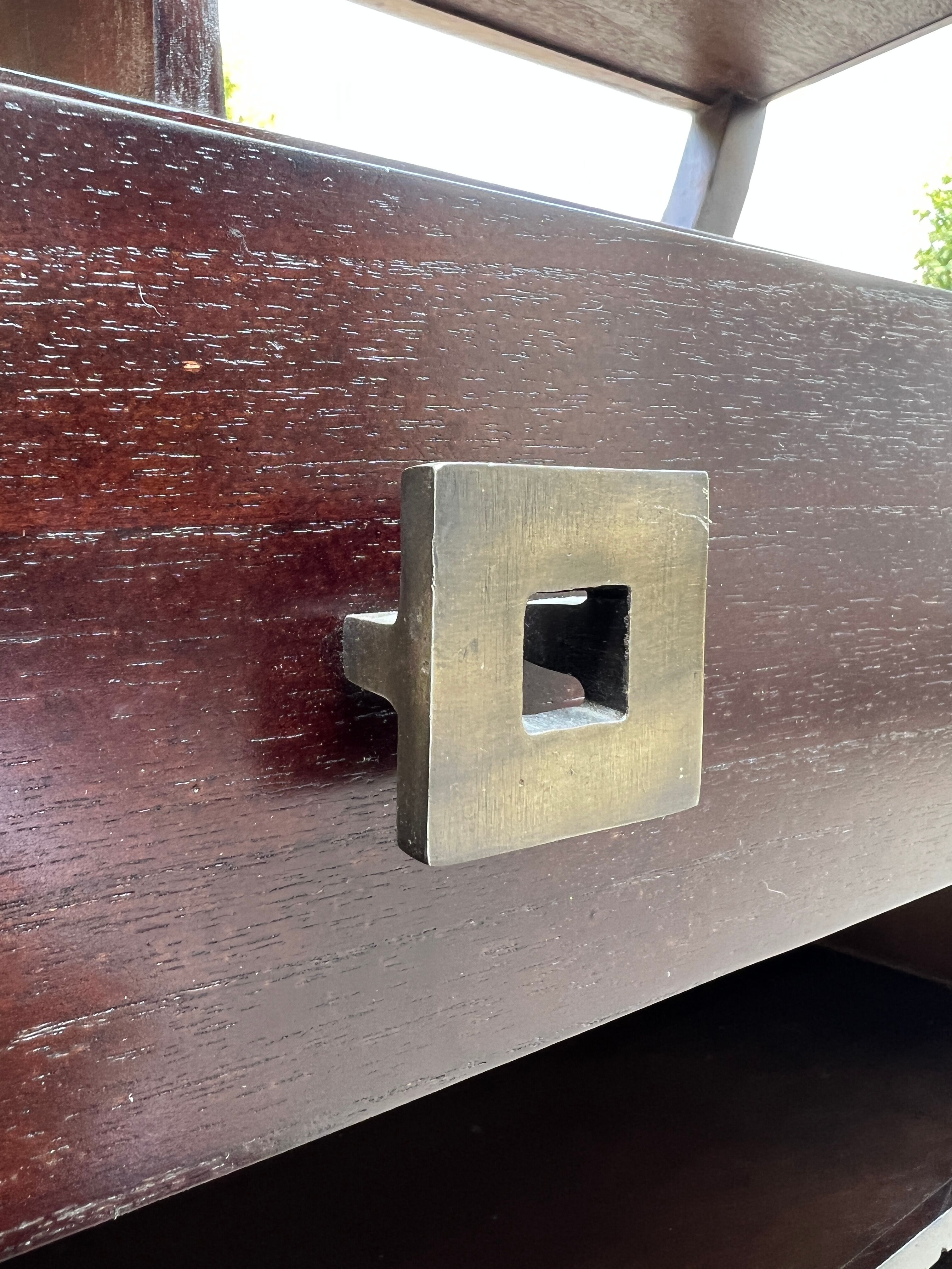 Round galay shelf on bahut sideboard