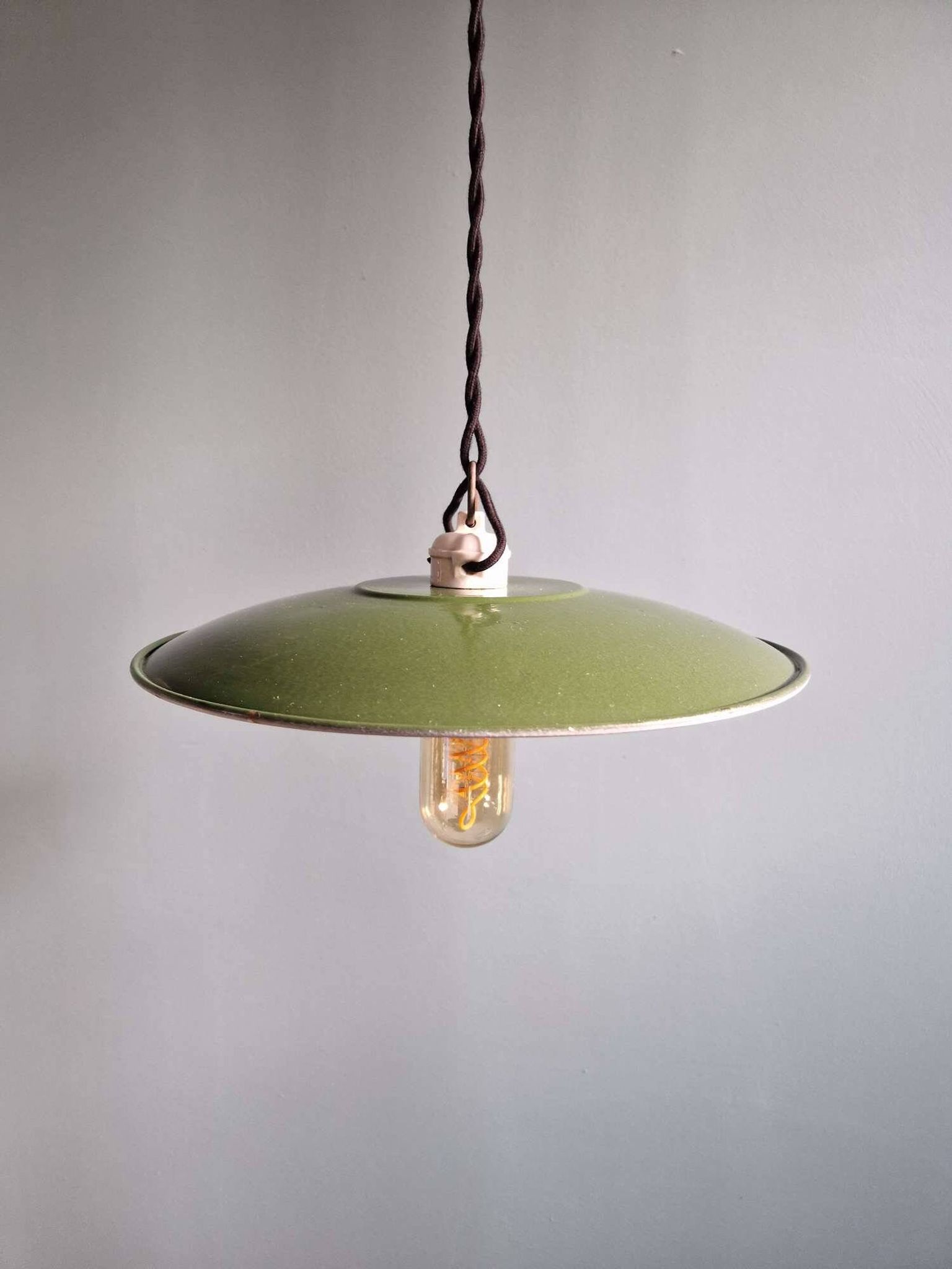 Trio of large industrial suspensions in green enamelled sheet metal.