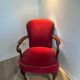 Antique armchair in burgundy velvet