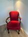 Antique armchair in burgundy velvet