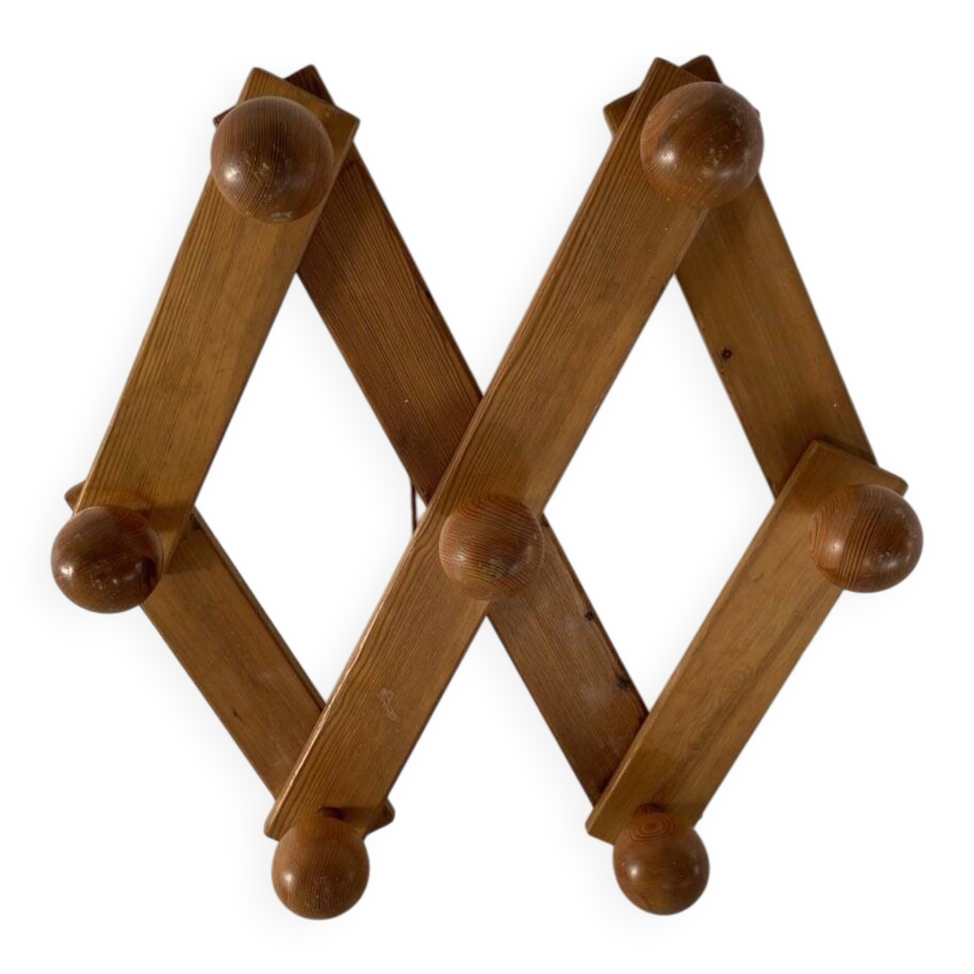Foldable ball coat rack made of fir wood.