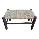 Moroccan bench in dark wood with woven palm leaf seat