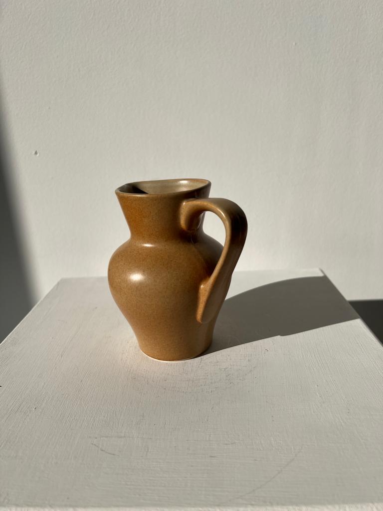 Pitcher in light beige sandstone