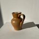 Pitcher in light beige sandstone