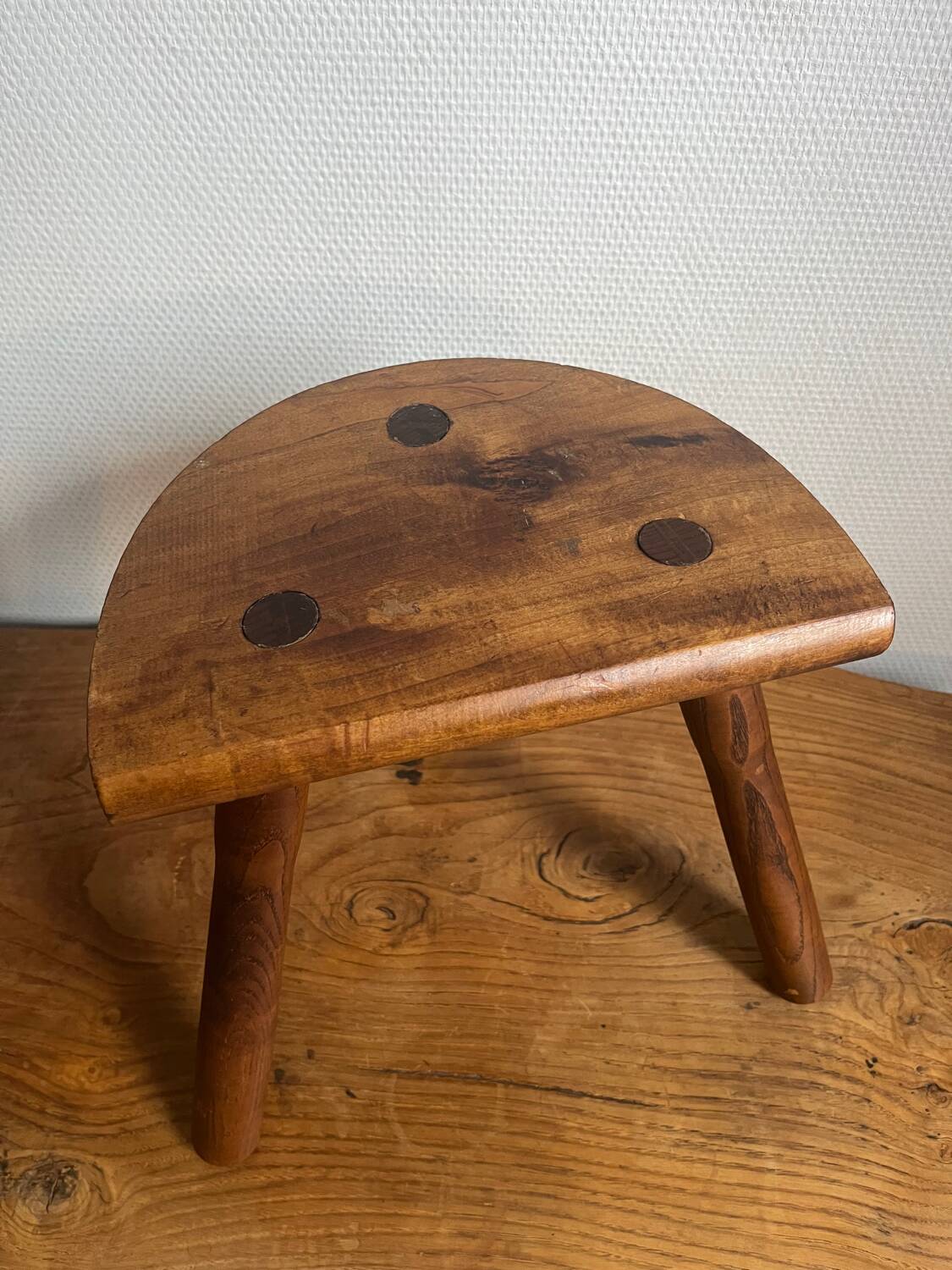 Wooden tripod stool