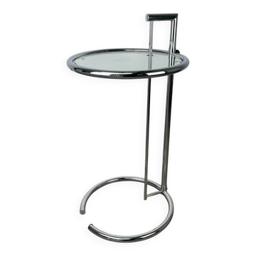 Chrome and glass design side table, adjustable.